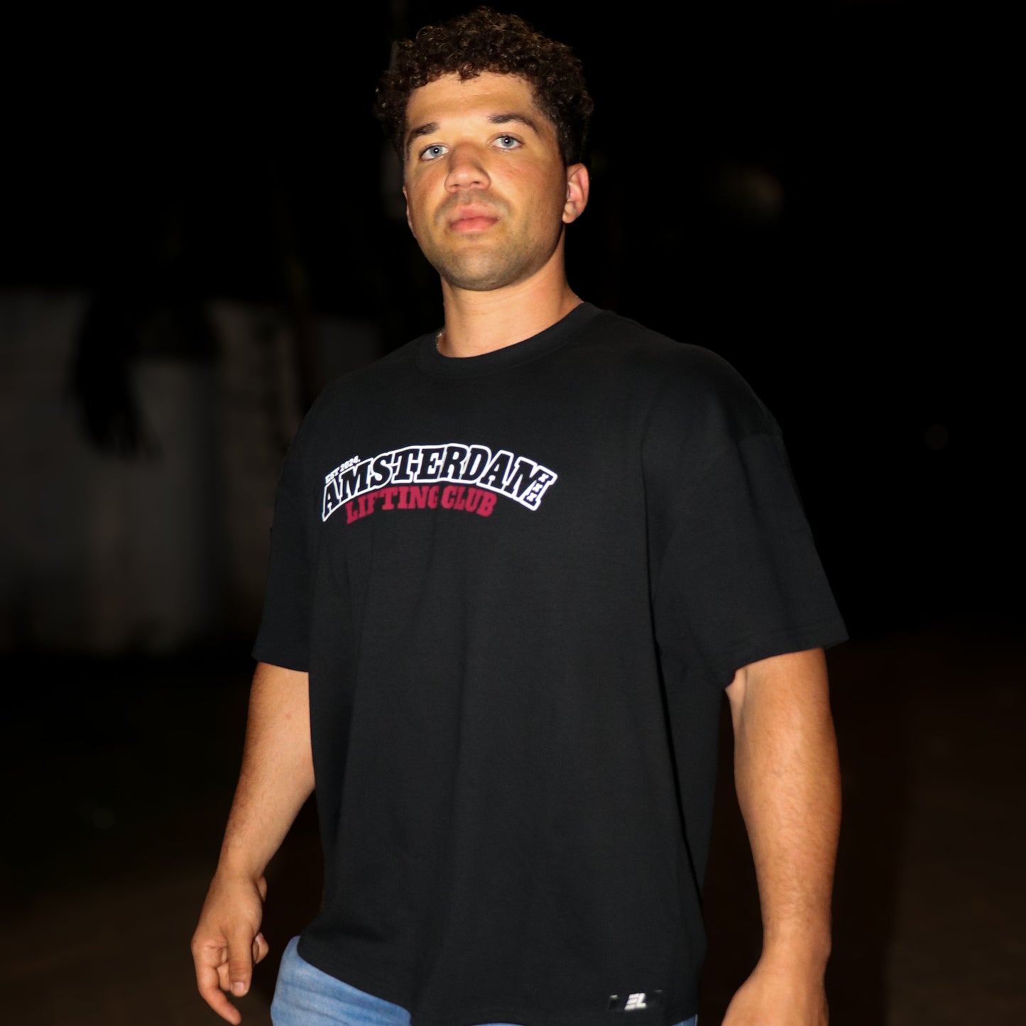 AMSTERDAM LIFTING FIT TEE — Black